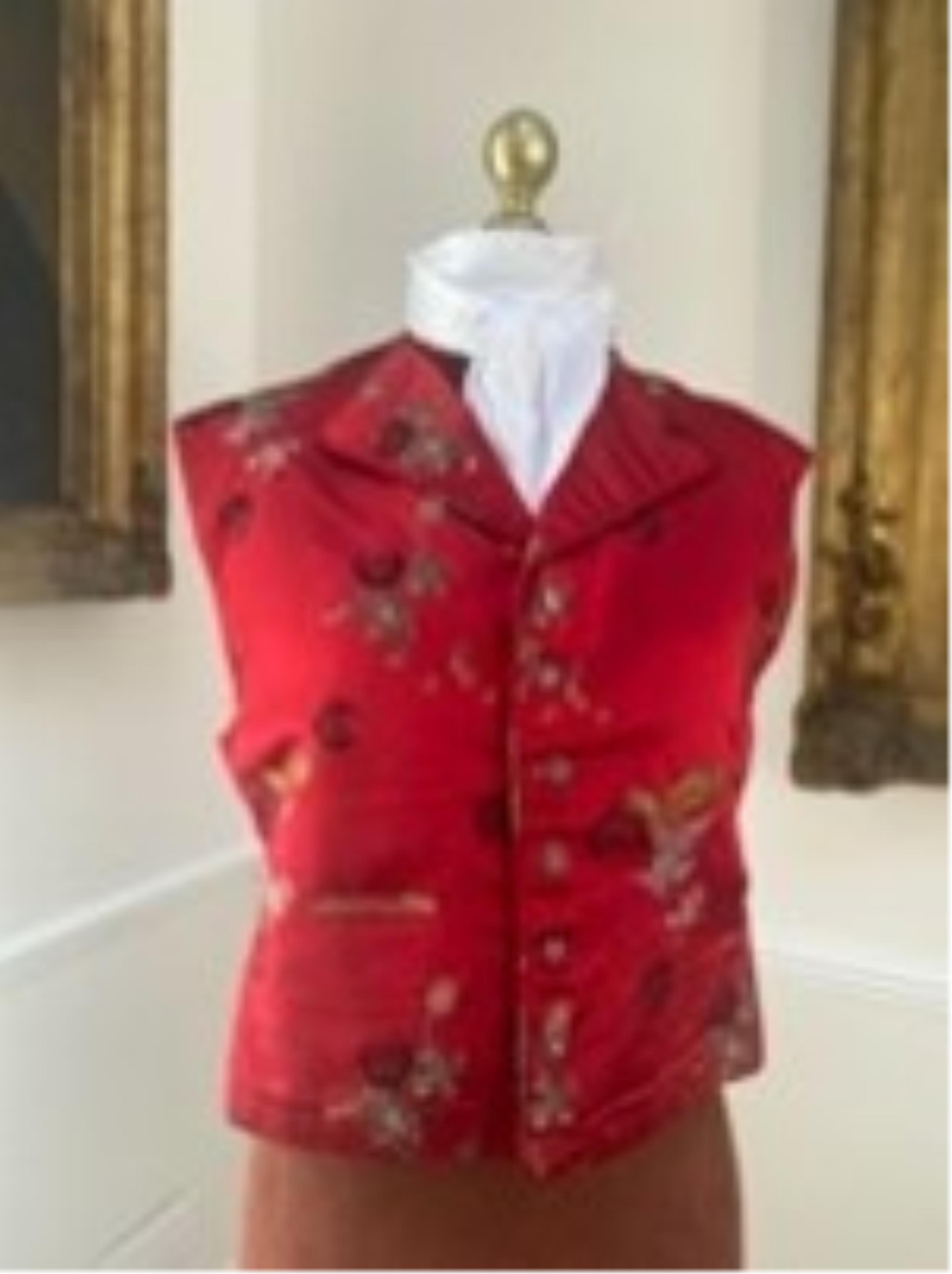 Four silk and brocade waistcoats (one red and three white/cream)